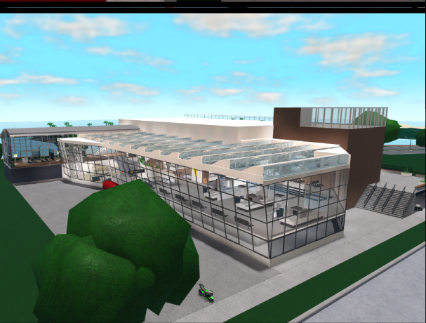 WAC terminal building with an aircraft parked on the tarmac